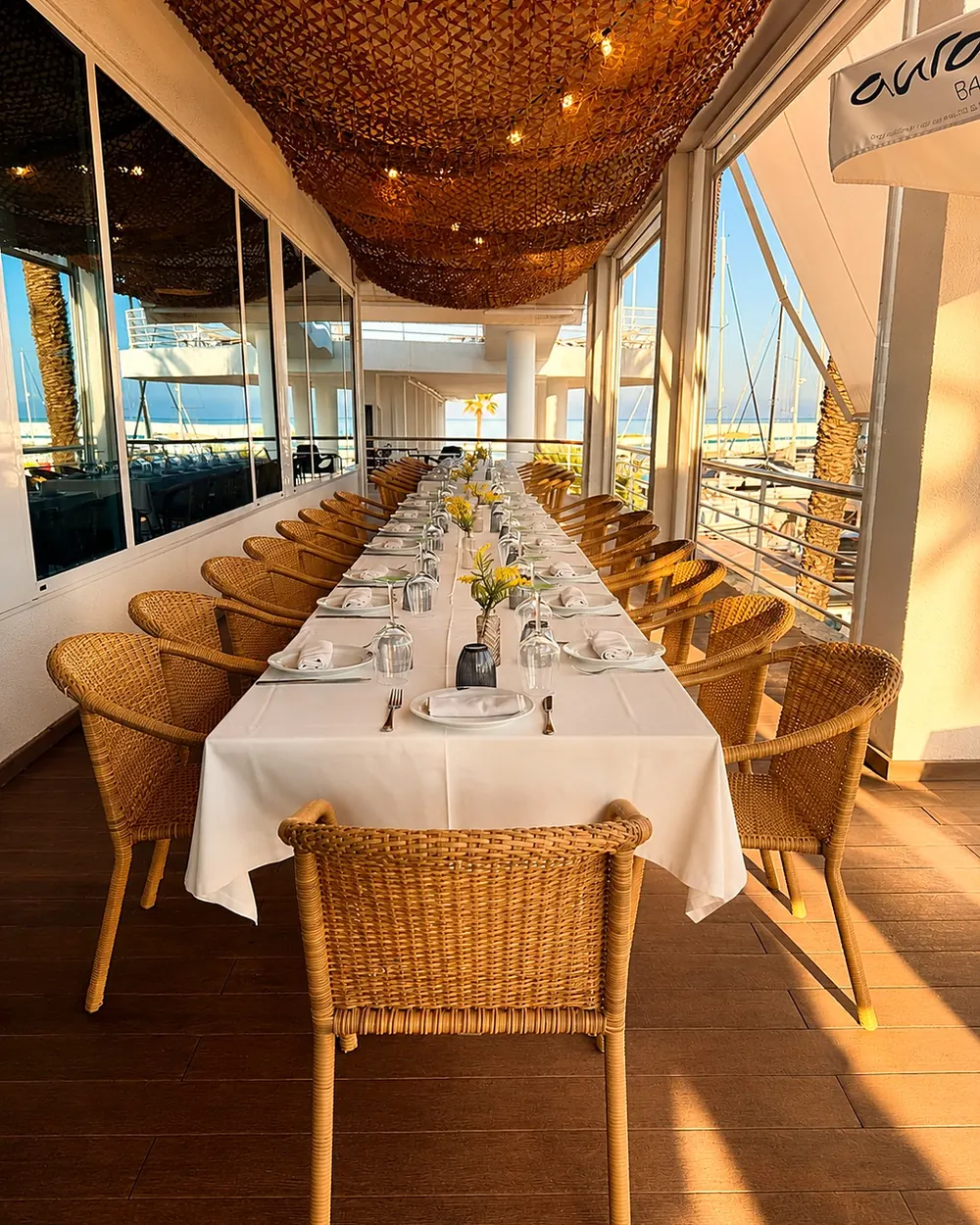 Long group table on the enclosed terrace
